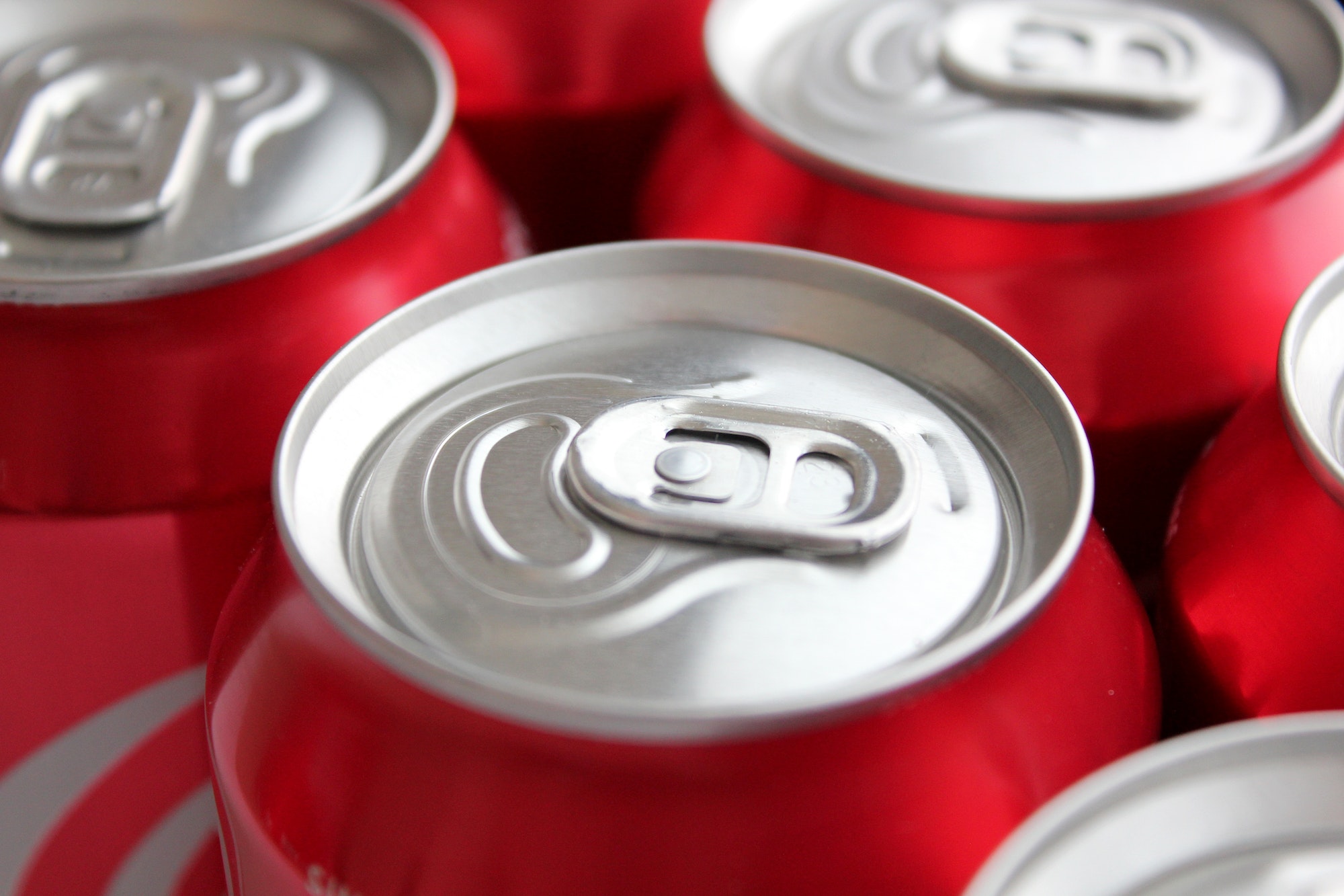 Close up of the ring pull on aluminium Coca Cola soda cans